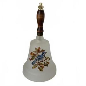 Westmoreland frosted glass bell with a blue jay and oak branch motif.
